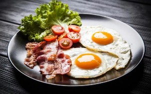 Two fried eggs with bacon